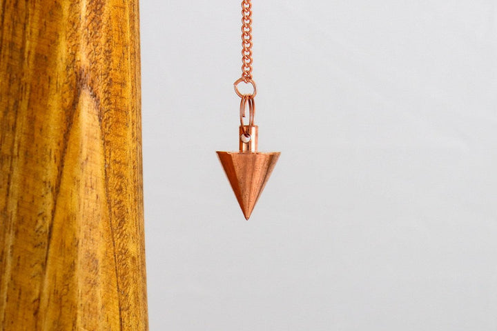 pendule cône en laiton cuivré