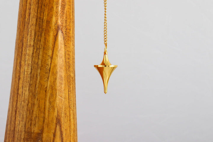 pendule kito en laiton doré