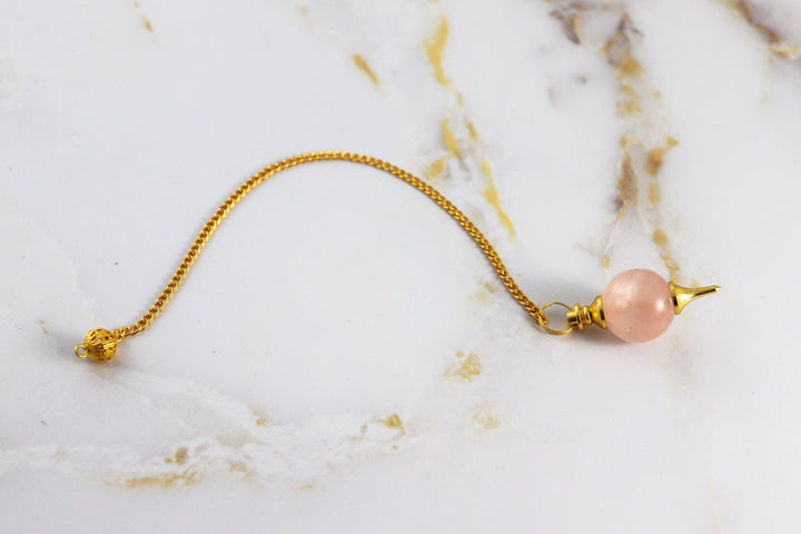 pendule sephoroton boule en quartz rose