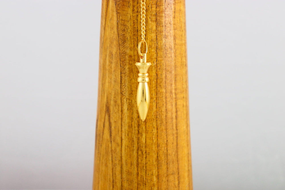 pendule de thot ou karnak en laiton doré
