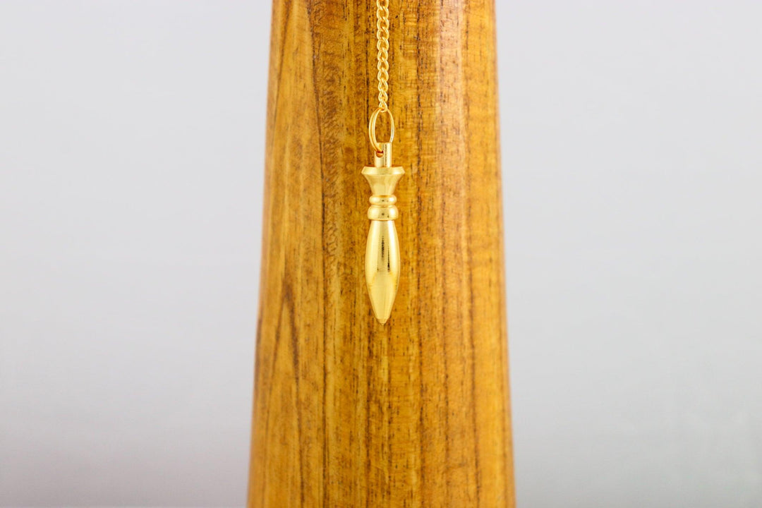 pendule de thot ou karnak en laiton doré