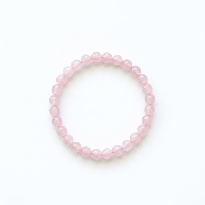 bracelet pierre naturelle quartz rose 6mm fond blanc #bracelet-6mm-quartz-rose